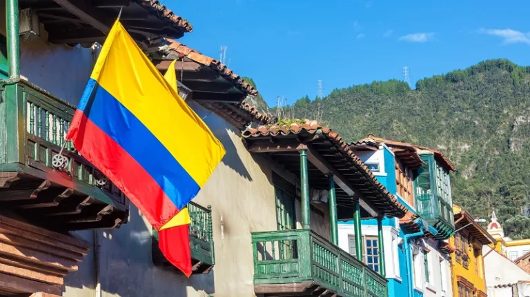 Colombian flag on a historic building in La Candelaria neighborhood in Bogota, Colombia